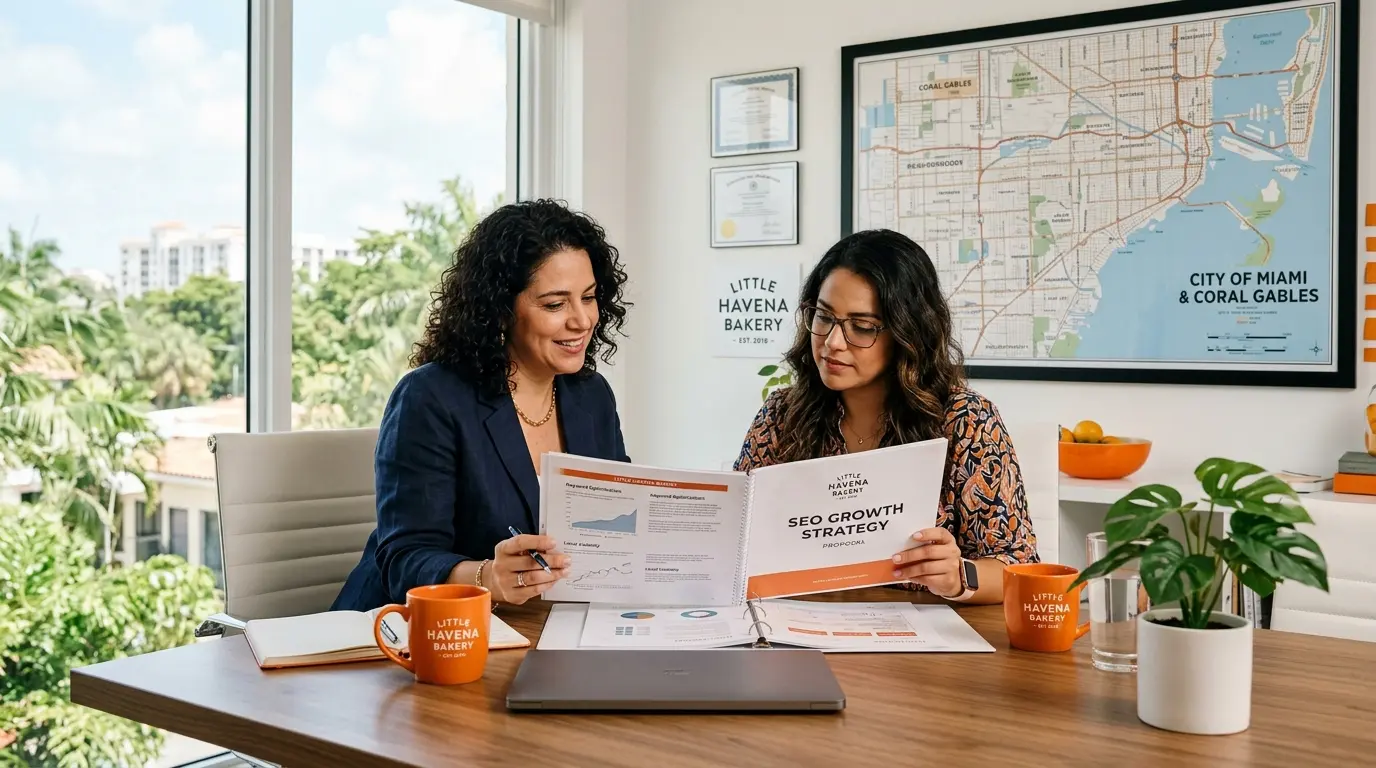 Two Miami small business owners reading an SEO proposal at a Coral Gables conference table